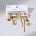 Detailed macro view of daisy enamel charms on gold stainless steel earrings set - Little Daisy Shape and Tassel Drop Earrings Set (E0070)