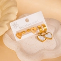 Set of 3 gold stainless steel earrings with heart charms and studs for women - Hollow Heart and White Enamel Heart Earrings Set (E0082)