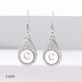 Close-up of silver teardrop earrings with pavé crystals and letter C engraving - Alphabet C Earrings (E1669)
