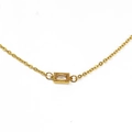 Detail of gold necklace with rectangular clear zircon pendant and beaded edge craftsmanship - Gold White Gem