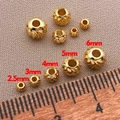 Detailed comparison of 18K gold plated spiral beads in sizes 2.5mm to 6mm with a ruler - 2.5mm Hole 1.0mm / 18K Gold