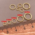 Diverse dimensioni di anellini aperti placcati oro 18k con misure per gioielli fai da te - 0.7x4mm / Oro 18K