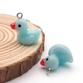 Light blue resin duck charm with silver loop for DIY jewelry and earring making - 17x19mm / Lake Blue