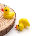 Cute yellow resin duck pendant charm with silver ring for DIY earring and jewelry making - 17x19mm / Yellow