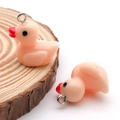 Pink resin duck charms for DIY jewelry making with silver rings on wood surface - 17x19mm / Orange Pink