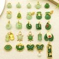 Green faux jade pendants with gold metal edges featuring various Chinese zodiac lucky charms - 25Pcs Pendant Set (SN1135)