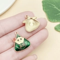 Cartoon rice dumpling charm with green enamel finish and gold metal back for DIY crafts - Success Triangle Zongzi (22885)