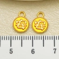 Golden round charm with An character relief for DIY bracelet jewelry making - An Character Round Tag (22611)