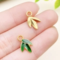 Bamboo leaf pendants in gold finish and green enamel glaze with circular hanging loops - Green Enamel Bright Gold Bamboo Leaf