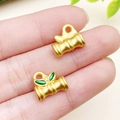 Golden bamboo joint pendant with green enamel leaves and matte finish for DIY jewelry - Green Enamel Lucky Bamboo Joint Charm