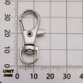 Polished silver swivel lobster clasp on a millimeter grid for size measurement - Silver Swivel Lobster Clasp (13017)