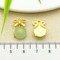 Green glass bow knot pendant charm with gold metal finish for DIY jewelry 12mm - One 16x11mm Piece - 22205g - 1.6g [light Green Glass Bow Buckle]