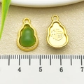 Golden gourd pendant with green jade inlay and Fu character engraving for jewelry - One 17x11mm 22218g 1.2g Green Glass Gourd-shaped Pendant With The Character "福" (fortune/blessing).