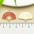 Red enamel fan charm with golden bamboo leaves and double rings for DIY jewelry making - Red Enamel Plum Blossom Fan (22449)