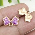 Colgante de lazo en esmalte púrpura con baño de oro para pulseras y joyería creativa - 15.5x10mm / Púrpura