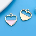 Pendentif coeur ajouré en alliage doré et émail rose pour la création de bijoux DIY - Cœur Évidé en Émail Rose