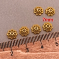 Detailed view of 7mm 18k gold plated hollow lotus spacer beads for jewelry making - Lotus Flower Cap 7x7mm Height 2mm / 18K Gold Plated Alloy