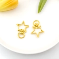 DIY gouden stervormige sleutelhanger met draaibare ring op wit keramisch bord - Ster (12815)