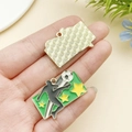 Soccer player alloy charm with green background and yellow star for DIY bracelets - Shooting Soccer Ball (22942) / 31x22mm