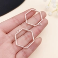 Colgantes hexagonales geométricos de aleación de plata pulida con anillas para joyería DIY - Bisel de Marco Hexagonal (22252)