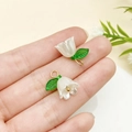 Pearly white lily of the valley acrylic charm with green leaf and golden metal loop - White