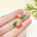 Roze acryl lelietje-van-dalen hanger met groene bladeren voor DIY sieraden maken projecten - Rood Oranje