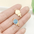 Colgante de piruleta dorado de aleación con esmalte azul en espiral para hacer joyas - Piruleta Redonda Azul Lago (12337)