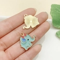 Colgante de elefante azul en aleación dorada con lazo de lunares rojos para joyería DIY - Elefante Pequeño Azul Lago (22971)