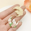 Handheld view of cartoon bunny and pearl moon charms for DIY jewelry and keychains - KC Gold Pink Moon Sakura Rabbit Style (23173)
