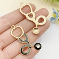 Ciondolo stetoscopio dorato con smalto nero e zircone per bracciale fai-da-te - Stetoscopio Grande Smalto Nero Oro KC