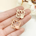 Pink bunny and purple star enamel pendant charms held in hand for DIY jewelry making - Pink Enamel Rhombus Square Alice Rabbit