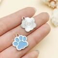 DIY silver alloy charms featuring a textured flower and a blue enamel cat paw pendant - Lake Blue Cat Paw (12071)
