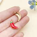 Red enamel chili pepper charm with gold plating held for jewelry size demonstration - 18x12x3mm / Red Chili Pepper (23379)