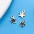 Ciondoli a stella in lega di zinco con smalto nero e finitura dorata per gioielli fai da te - 6.5x8mm / Nero (Piccolo)