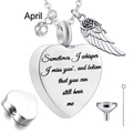 Detail view of heart-shaped cremation pendant with angel wing and April birthstone kit - April Birthstone