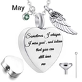 Macro detail of heart urn necklace with angel wing charm and May birthstone kit - May Birthstone