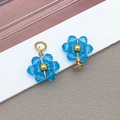 Blauer Kristall-Gänseblümchen-Anhänger mit Golddrahtwicklung für DIY-Schmuck - Transparent Pfauenblau Gänseblümchen Kristallblume (T1259)