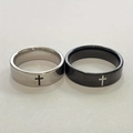 Close-up of minimalist stainless steel cross rings in silver and matte black finish - Cross Engraved Style (Couple Ring Style 2)