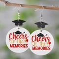Acrylic graduation cap drop earrings with Cheers to the Memories text on round charms - Cheers to the Memories Style
