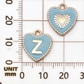 Lichtblauwe hartvormige hanger van email met gouden letter Z en gedetailleerde rand - Letter Z / Meerblauw
