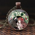 Vintage bronze Taurus necklace with intricate glass dome and celestial illustration - Taurus