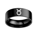 Macro shot of matte black stainless steel ring featuring a white Taurus zodiac sign detail - Taurus