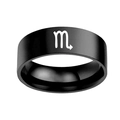 Macro shot of matte black stainless steel ring featuring white Scorpio zodiac symbol detail - Scorpio