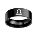 Macro view of black stainless steel Libra ring with minimalist white zodiac sign symbol - Libra