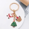 Porte-clés de Noël avec Père Noël, renne et sapin sur base en alliage doré - Renne Père Noël Sapin de Noël (ER813)