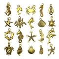 Set 20 colgantes marinos de aleación dorada vintage con sirena y delfín para joyería DIY - Serie Océano Oro Antiguo