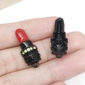 Macro shot of lipstick pendant charm with red oil drip finish and colorful rhinestones - Black Red Enamel Rhinestone Lipstick 10x25mm (12361) 1.9g