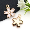 Pink cherry blossom alloy charm with rhinestone center and golden metal finish - White Enamel Rhinestone Cherry Blossom Style (9922)