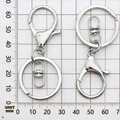 Silver lobster clasp with 30mm round keyring on measurement grid background - Keychain Clasp / 35x65mm / White K/Silver