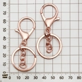 Pair of rose gold 25mm metal keychains with lobster clasp and round flat ring - Round Keychain with Chain / 35x65mm / Rose Gold